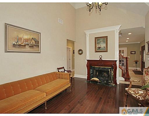 1881 Raritan Road Scotch Plains, NJ 07076 - Photo 15 of 18 a living room with furniture and a fireplace