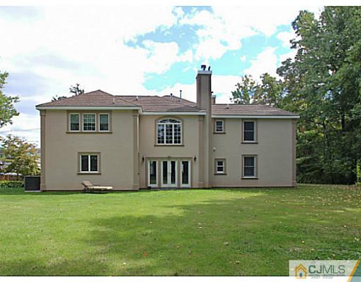 1881 Raritan Road Scotch Plains, NJ 07076 - Photo 18 of 18 a front view of a house with garden