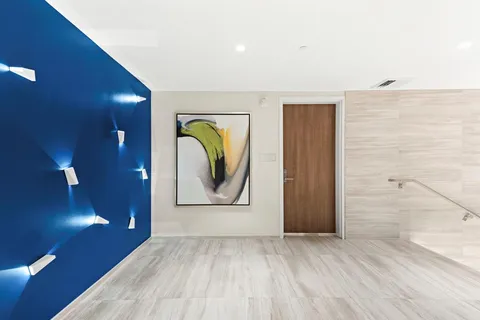 a view of a livingroom with wooden floor