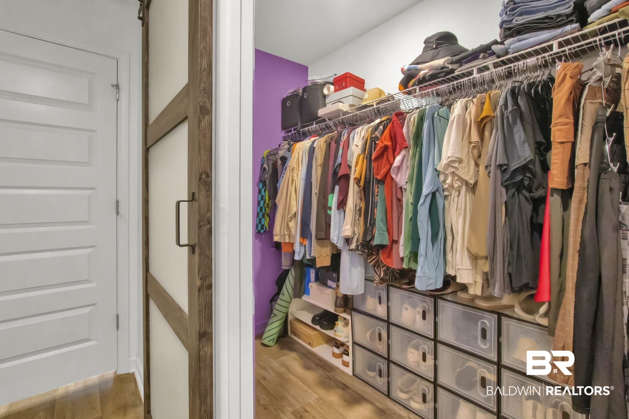 23810 Unbridled Loop Daphne, AL 36526 - Photo 24 of 50 Walk in closet featuring hardwood / wood-style flooring