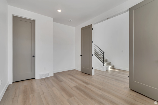 1302 1475 East, Unit 40 Payson, UT 84651 - Photo 5 of 34 Unfurnished room featuring light wood finished floors and recessed lighting