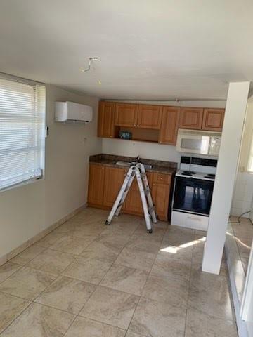 2830 Northeast 7th Terrace Pompano Beach, FL 33064 - Photo 5 of 11 a view of utility room