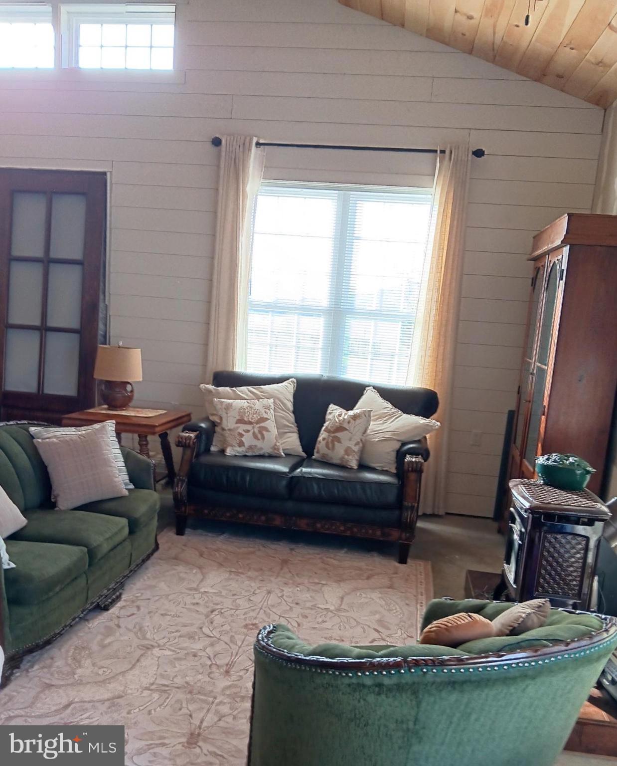 867 Kibler Road Quicksburg, VA 22847 - Photo 7 of 18 a living room with furniture and a window