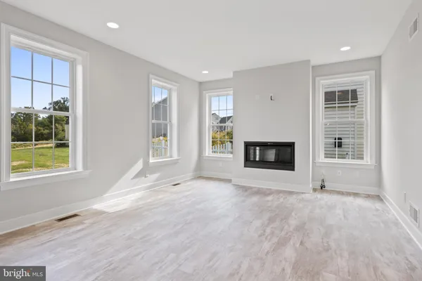 a kitchen with stainless steel appliances granite countertop a stove and a sink
