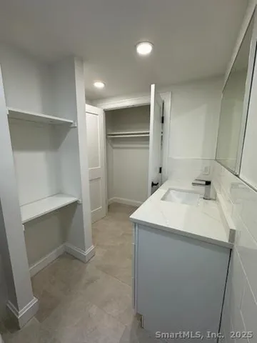 a utility room with cabinets