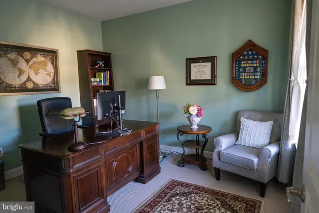 a kitchen with large counter space appliances and a sink