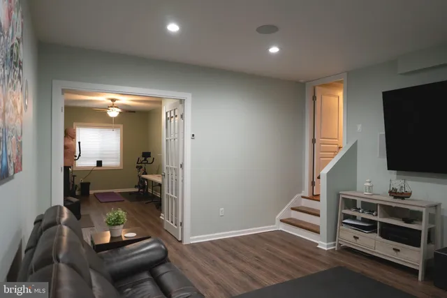 a view of a livingroom with breakfast area and furniture