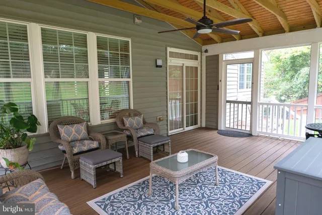 a big house with a big yard and large trees