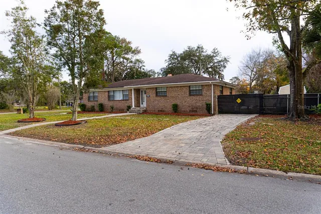 front view of a house with a yard