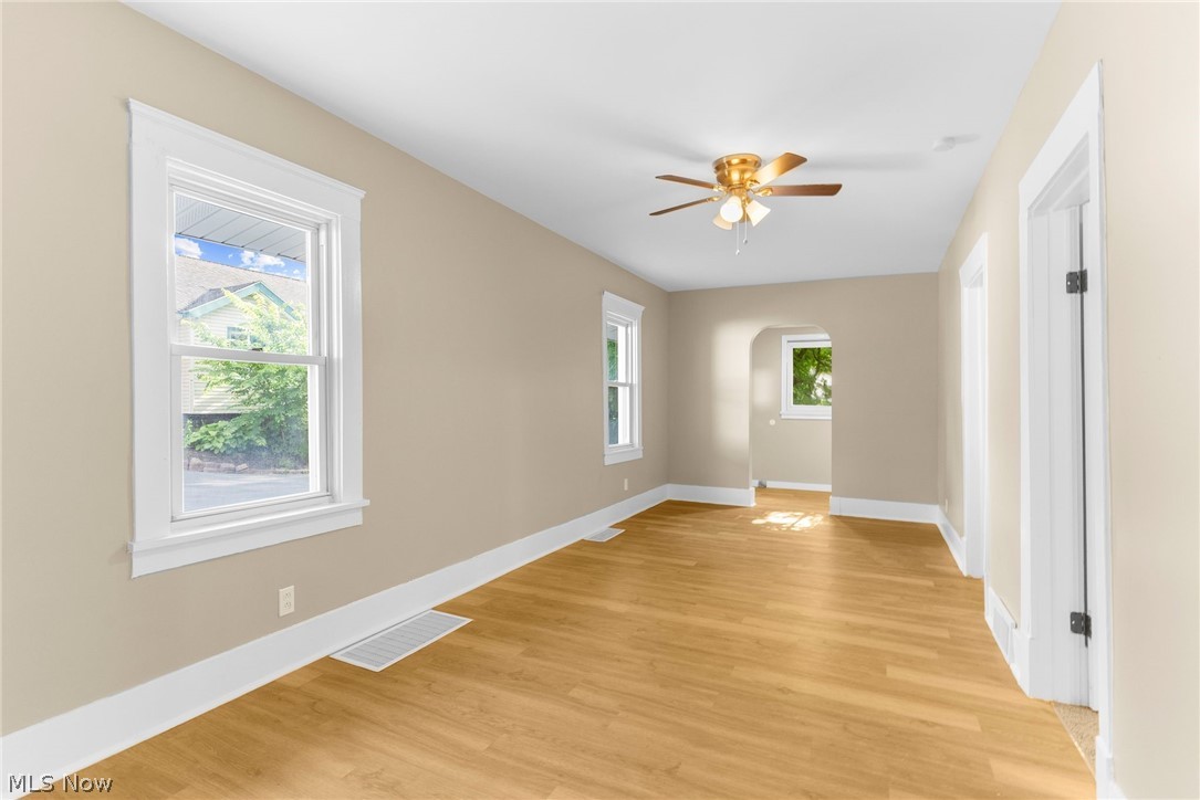 403 Mosier Road Girard, OH 44420 - Photo 20 of 22 Empty room with ceiling fan and light hardwood / wood-style floors