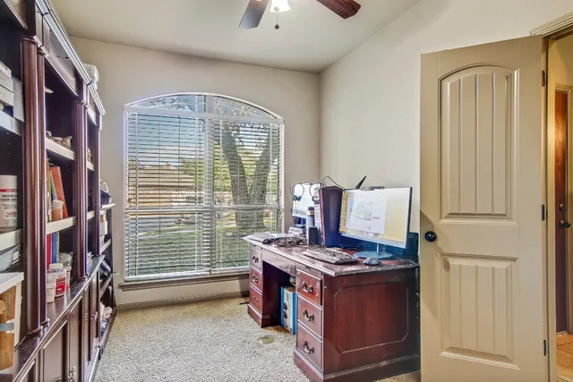 a view of a street with balcony