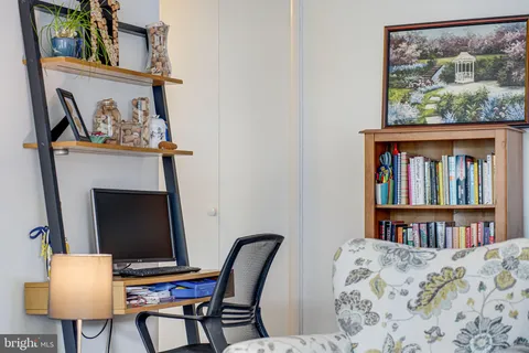 a view of a bedroom with furniture and the floor