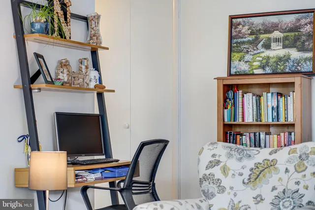 a view of a bedroom with furniture and the floor
