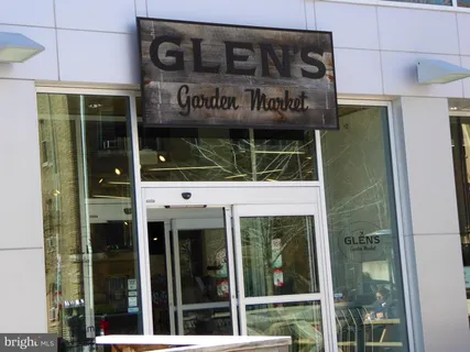 a view of a building with sitting area