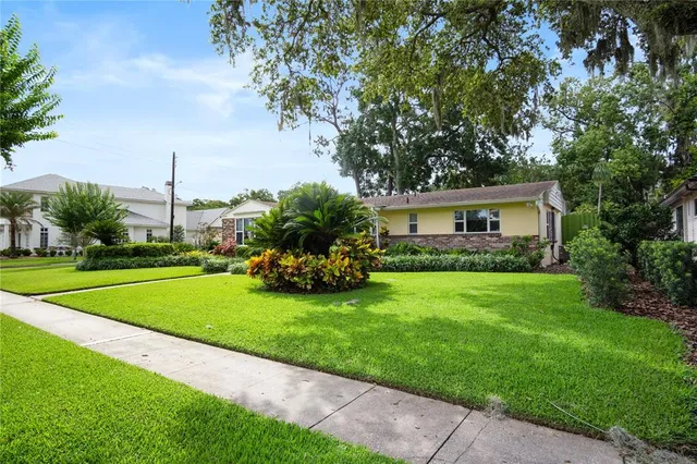 a house view with a garden space