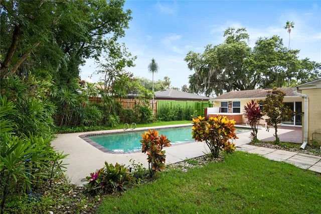 a view of a garden with a patio