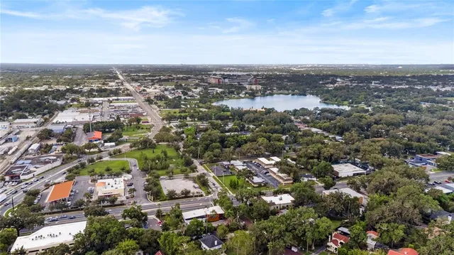 an aerial view of a house with a garden