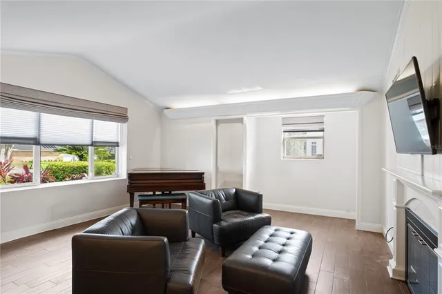 a living room with furniture and a window