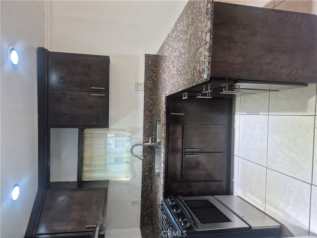 15080-15082 Roxford Street Sylmar, CA 91342 - Photo 5 of 8 Inside view of Kitchen