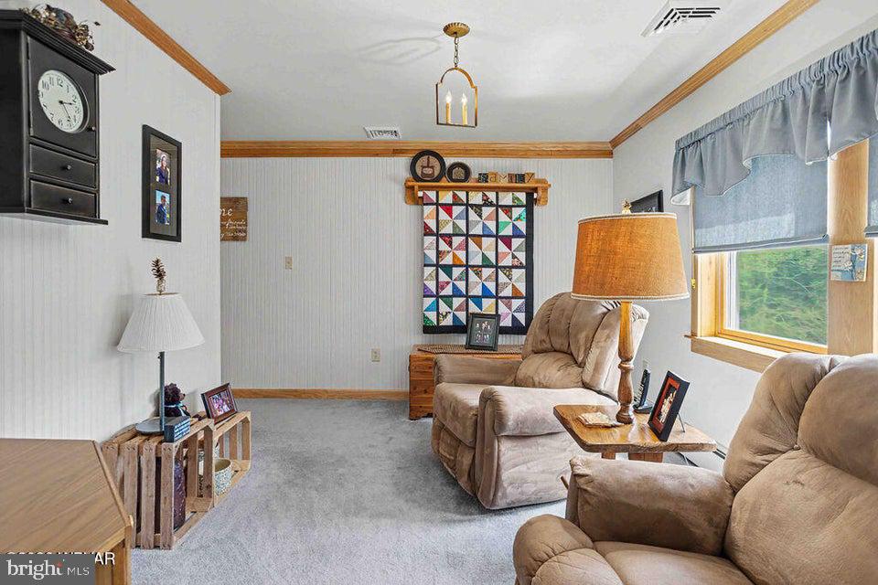 2270 Pine Tree Road Hughesville, PA 17737 - Photo 44 of 90 Cozy corner with vibrant quilt art.