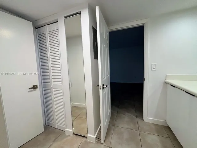 a view of closet area with window