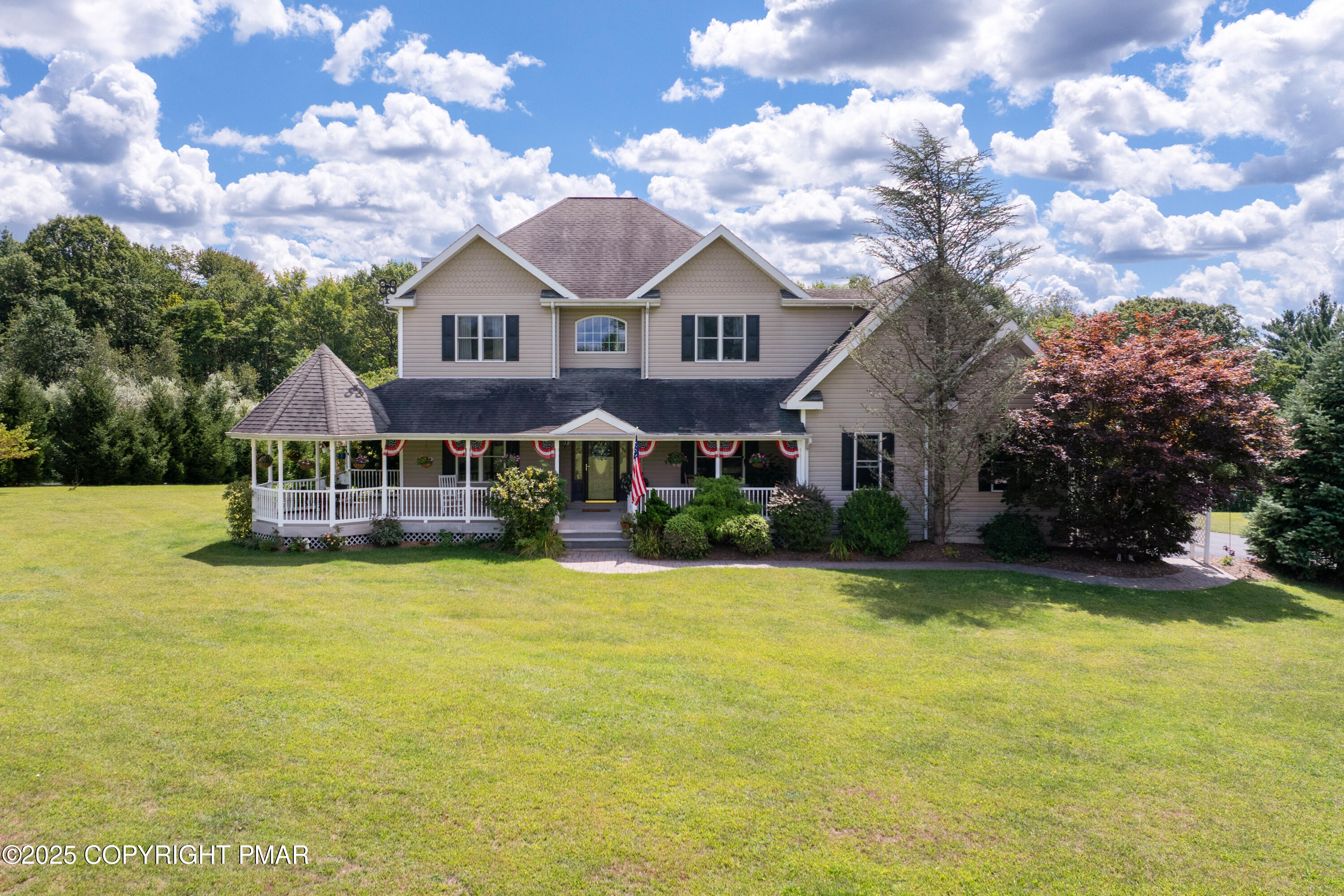 150 Red Oak Drive Palmerton, PA 18071 - Photo 2 of 76 a front view of a house with swimming pool having outdoor seating