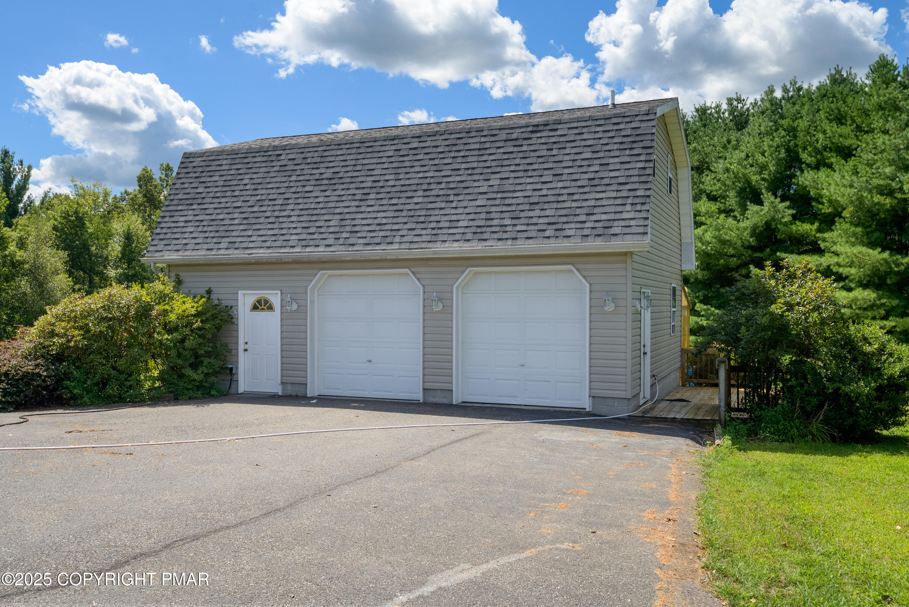 150 Red Oak Drive Palmerton, PA 18071 - Photo 25 of 76 a front view of a house with a garage