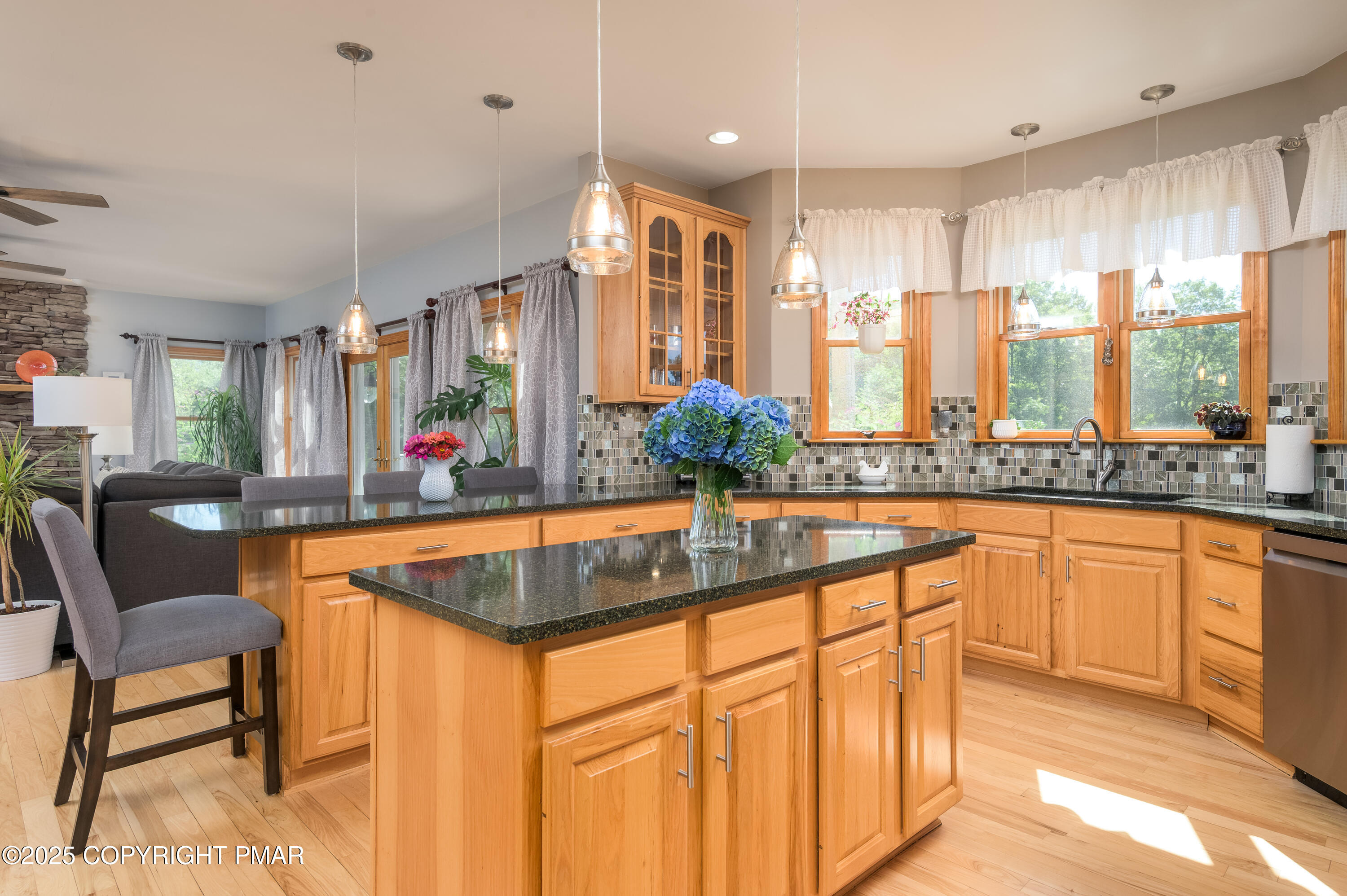 150 Red Oak Drive Palmerton, PA 18071 - Photo 30 of 76 a kitchen with stainless steel appliances granite countertop sink stove and white cabinets