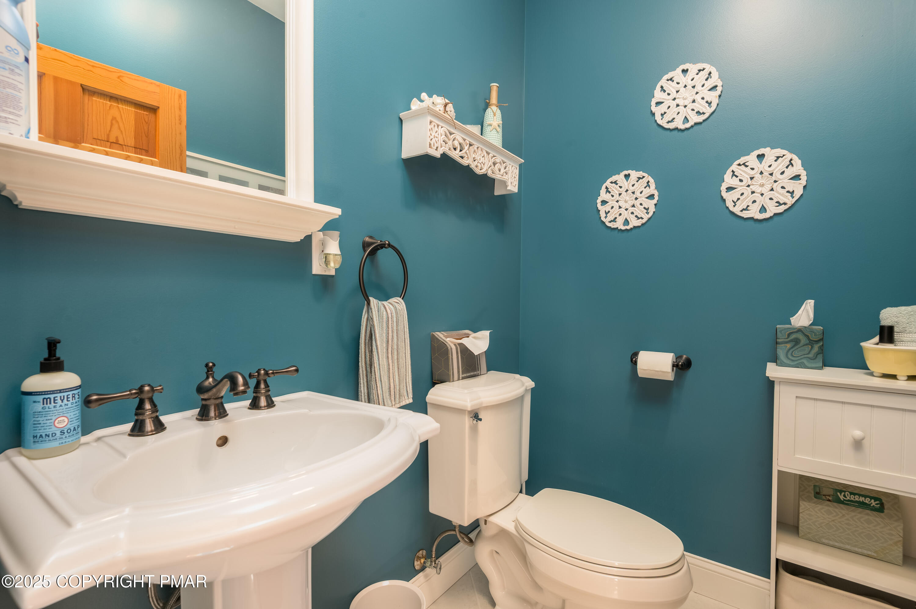 150 Red Oak Drive Palmerton, PA 18071 - Photo 41 of 76 a bathroom with a toilet a sink and a mirror