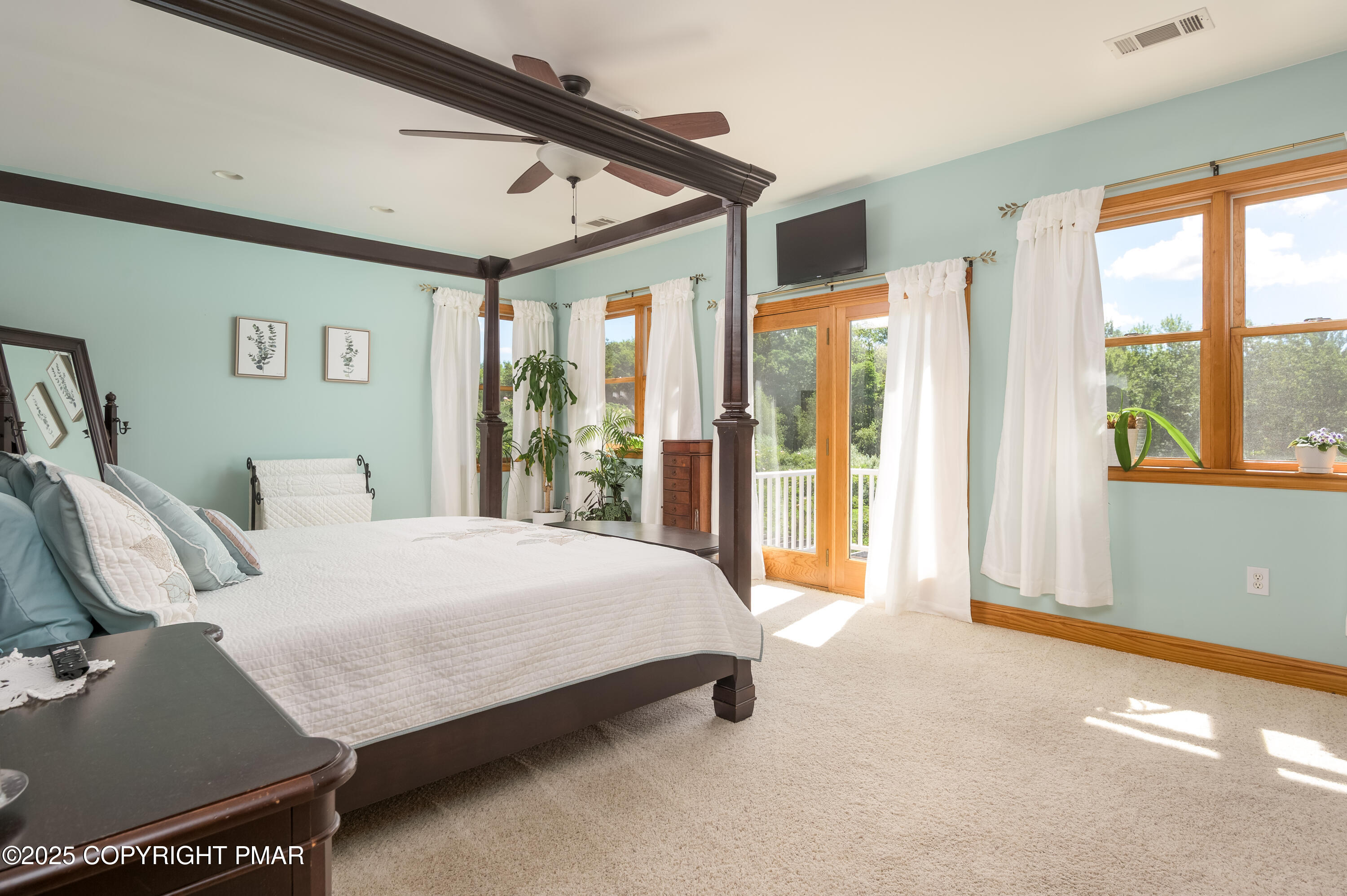 150 Red Oak Drive Palmerton, PA 18071 - Photo 45 of 76 a spacious bedroom with a bed and large windows