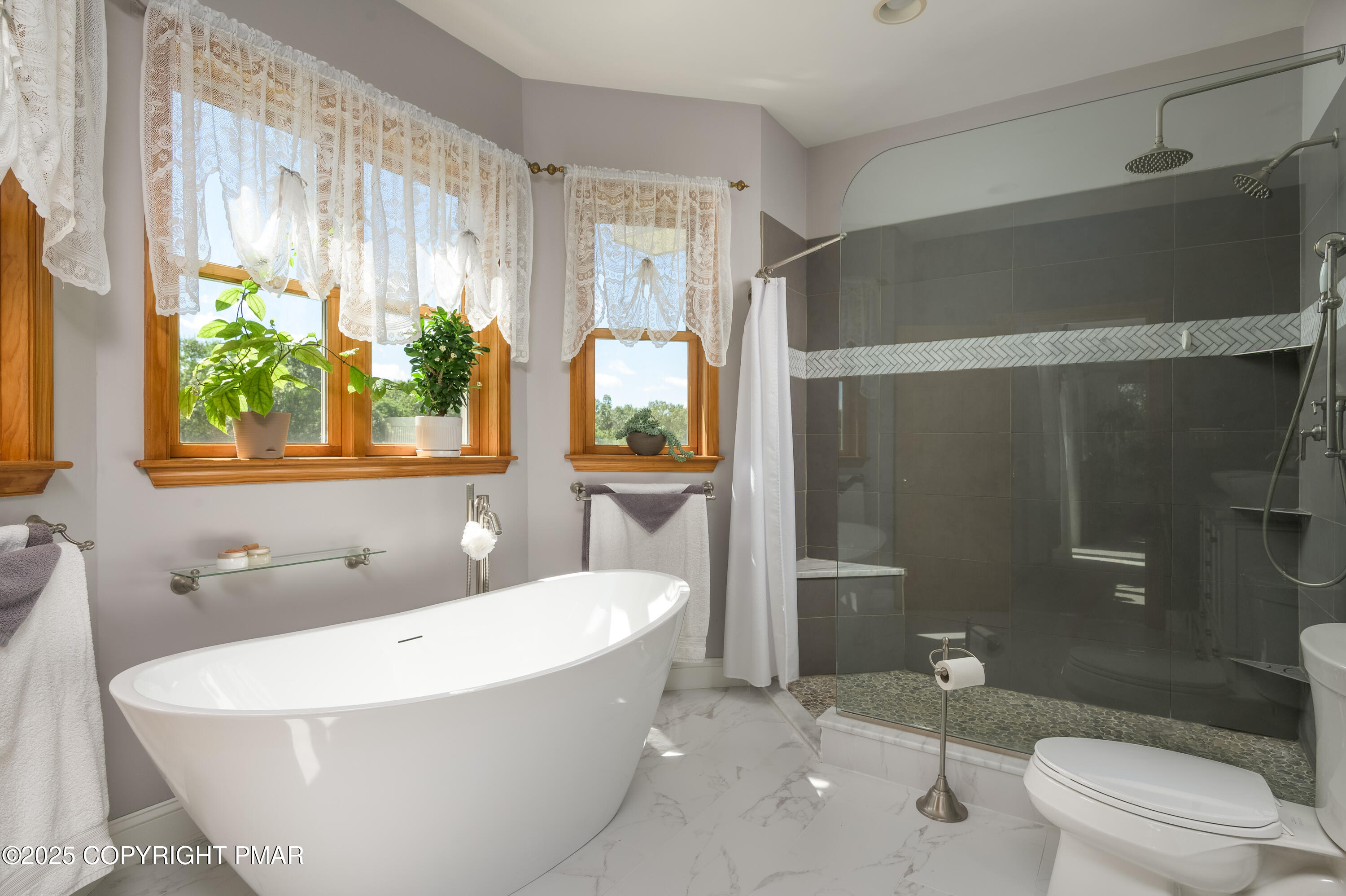 150 Red Oak Drive Palmerton, PA 18071 - Photo 49 of 76 a white bath tub sitting next to a toilet and a shower