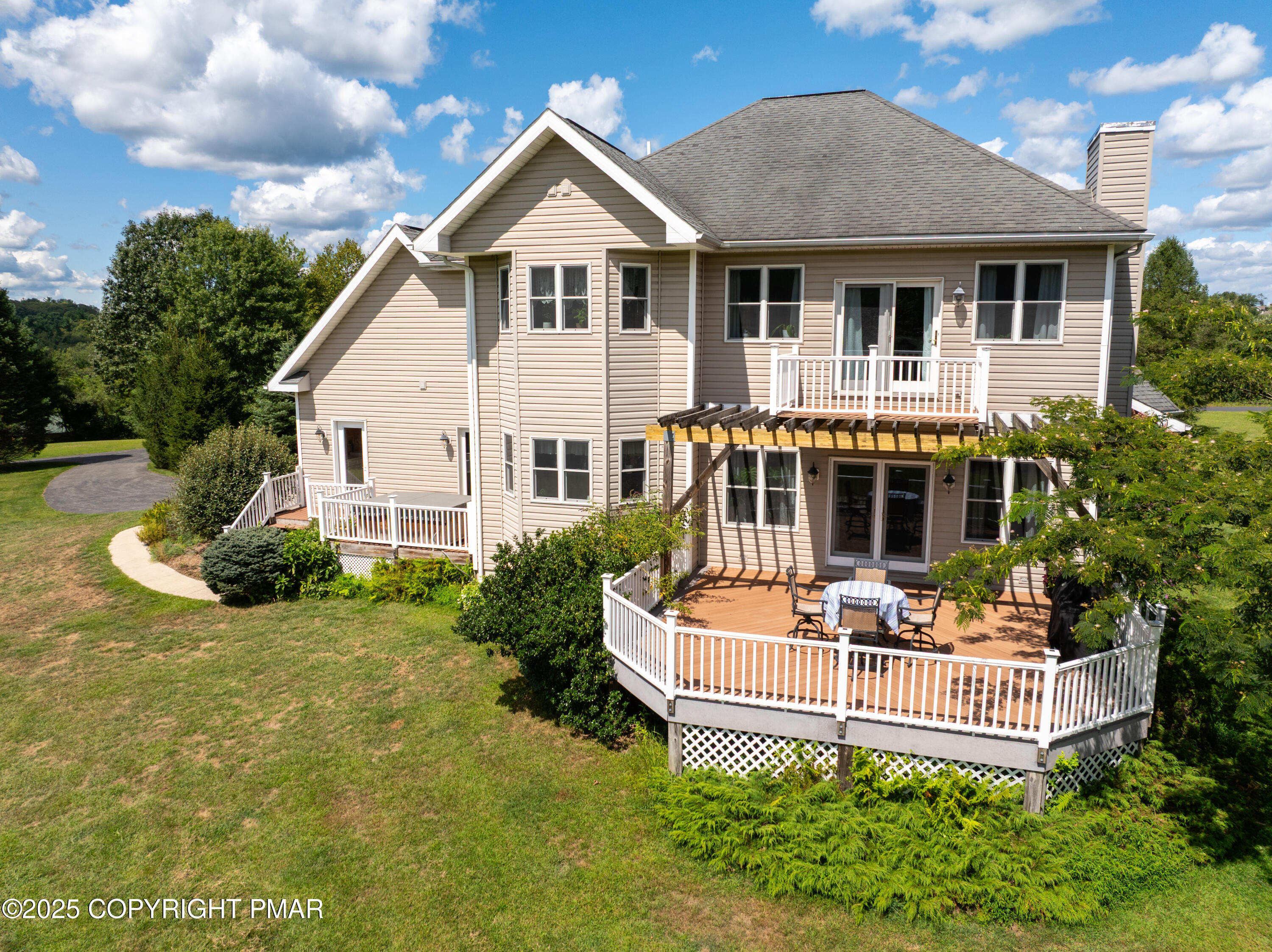150 Red Oak Drive Palmerton, PA 18071 - Photo 5 of 76 a front view of a house with a yard outdoor seating and garage