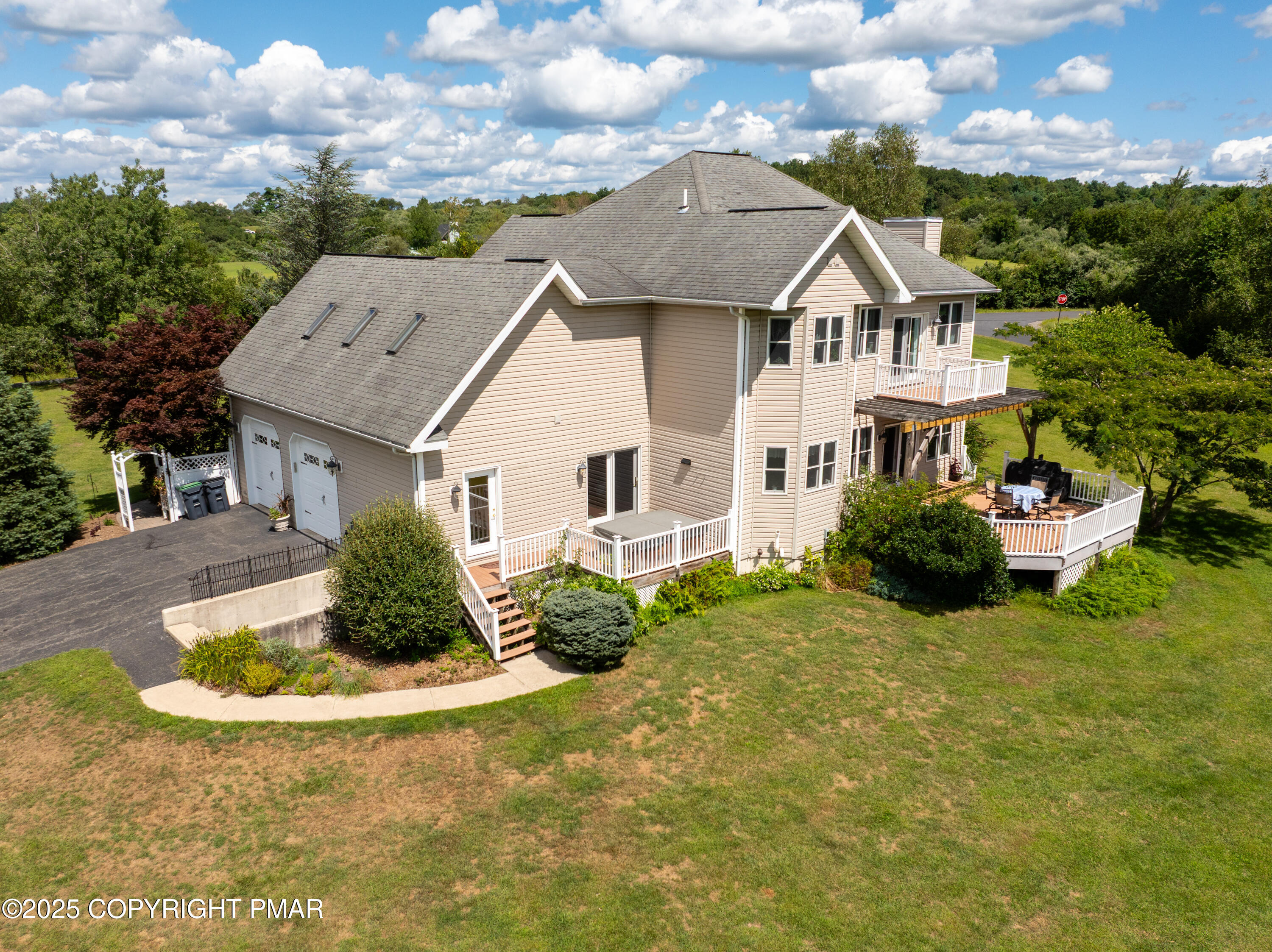 150 Red Oak Drive Palmerton, PA 18071 - Photo 6 of 76 a aerial view of a house with table and chairs