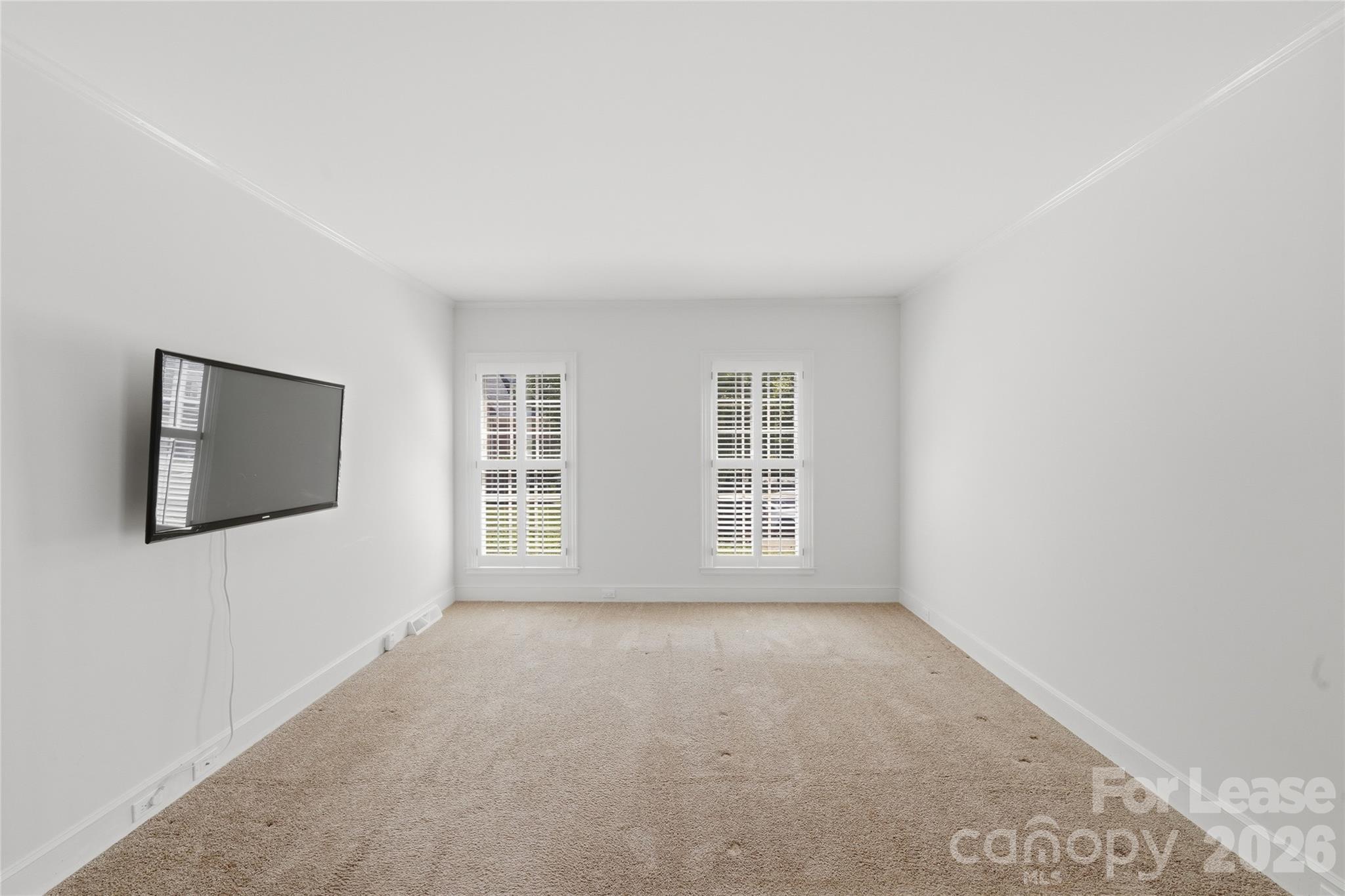 5906 Sharon Hills Road Charlotte, NC 28210 - Photo 5 of 30 a view of an empty room with a window