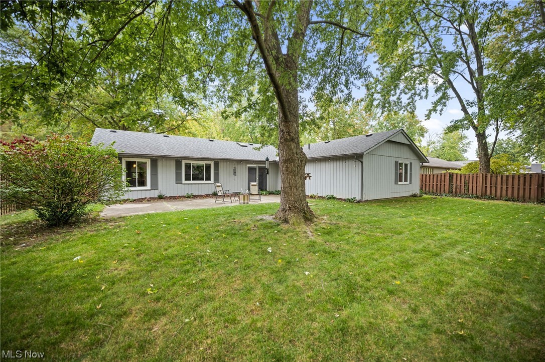 10798 Gate Post Road Strongsville, OH 44149 - Photo 30 of 32 Rear view of house with a lawn