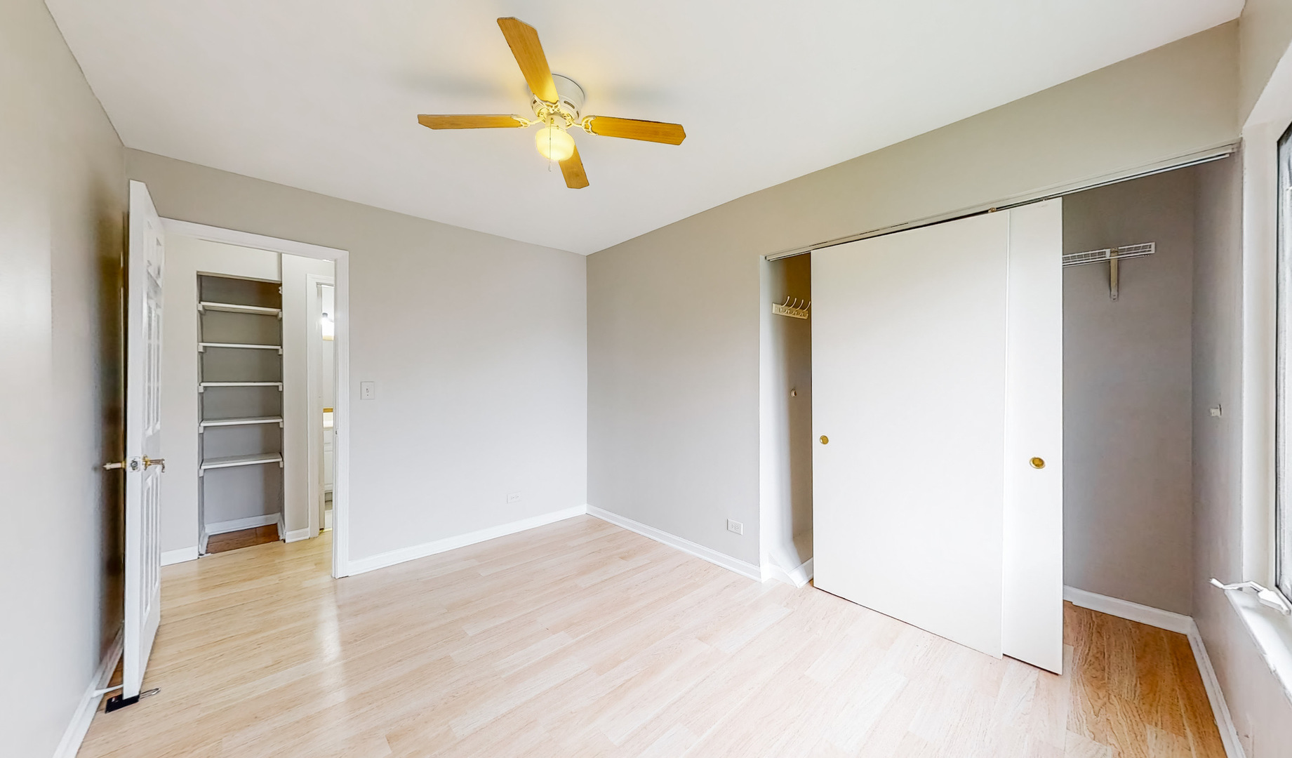 20 Elm Court, Unit 3 Bolingbrook, IL 60440 - Photo 15 of 21 wooden floor in an empty room with a window