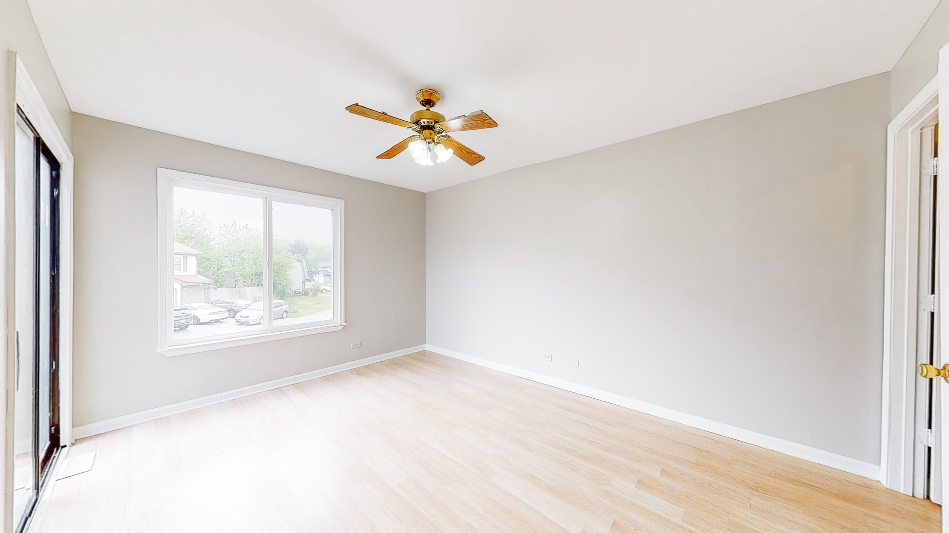 20 Elm Court, Unit 3 Bolingbrook, IL 60440 - Photo 16 of 21 a view of room with a ceiling fan and window