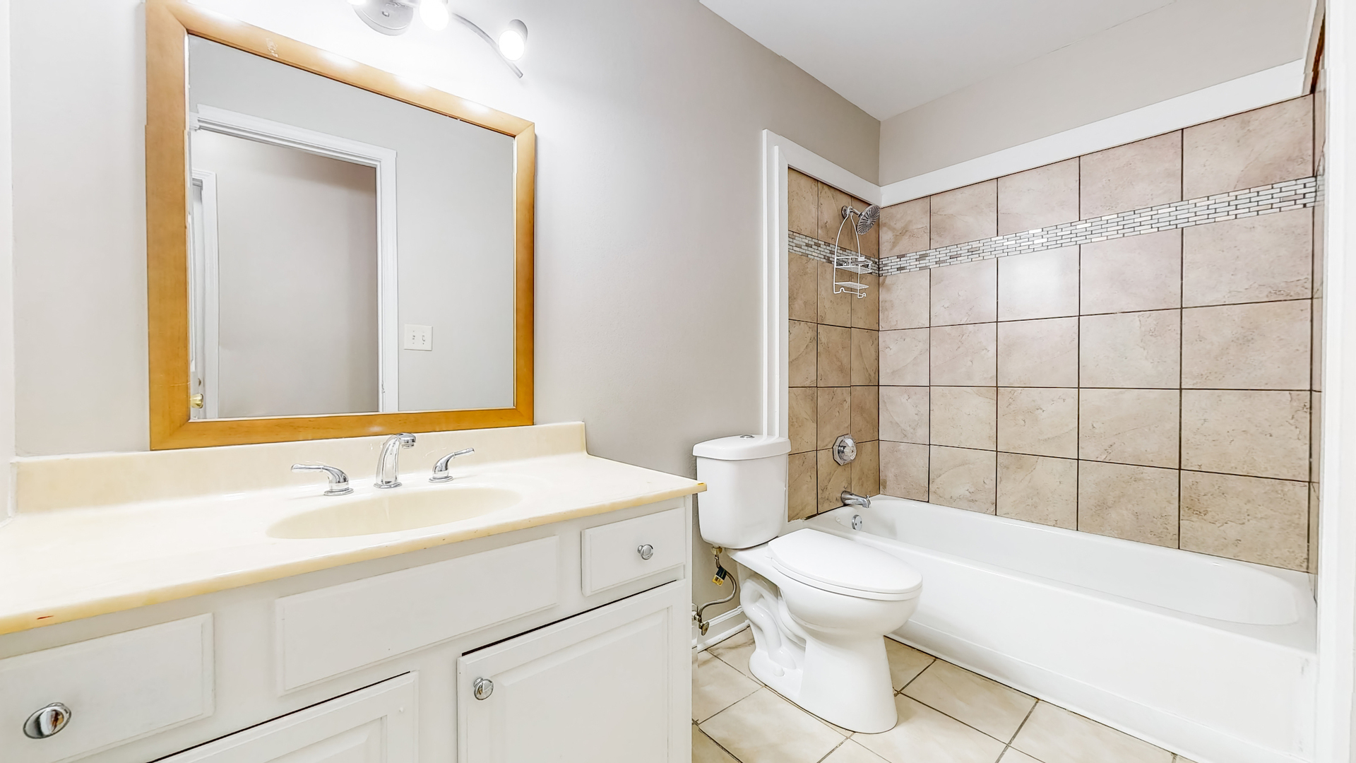 20 Elm Court, Unit 3 Bolingbrook, IL 60440 - Photo 18 of 21 a bathroom with a sink a toilet and shower