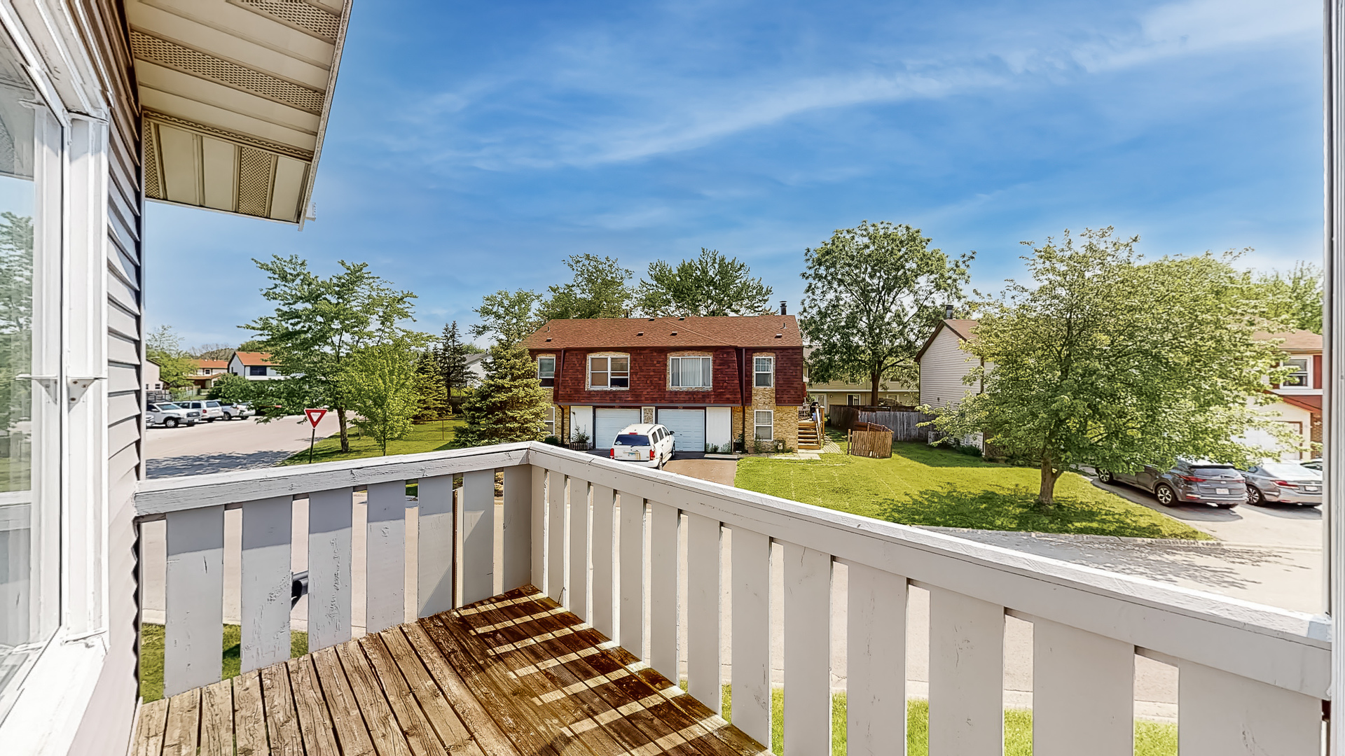 20 Elm Court, Unit 3 Bolingbrook, IL 60440 - Photo 4 of 21 a view of a street from a balcony
