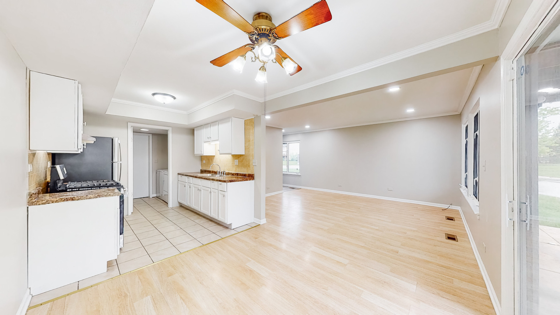 20 Elm Court, Unit 3 Bolingbrook, IL 60440 - Photo 10 of 21 a large white kitchen with a stove and a refrigerator