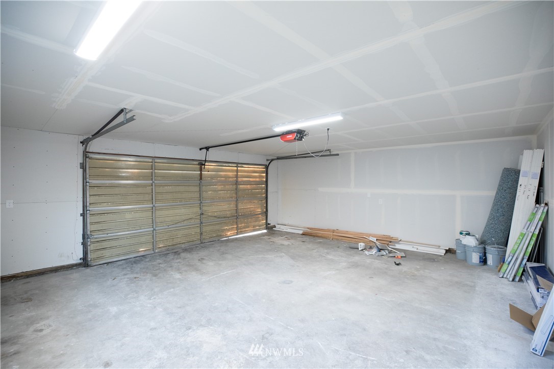 314 3rd Street Roy, WA 98580 - Photo 27 of 30 an empty room with cabinet and view