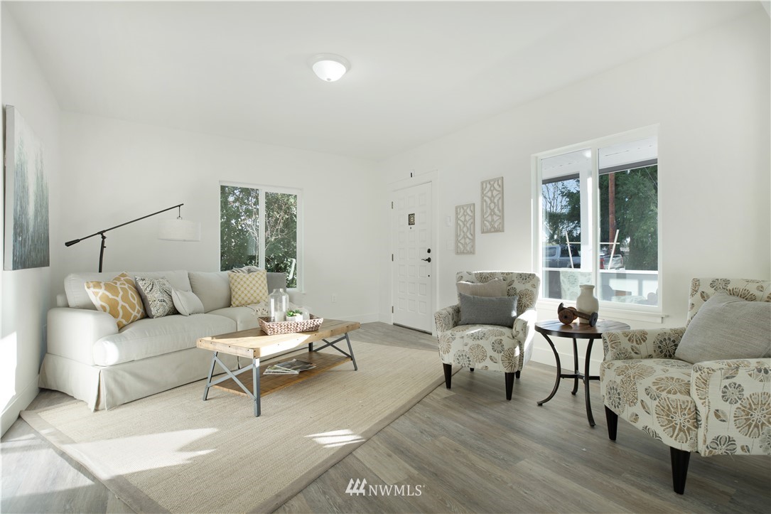 314 3rd Street Roy, WA 98580 - Photo 4 of 30 a living room with furniture and wooden floor