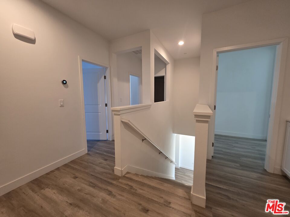 5308 Harvard Way Cypress, CA 90630 - Photo 16 of 17 a view of entryway and hall with wooden floor