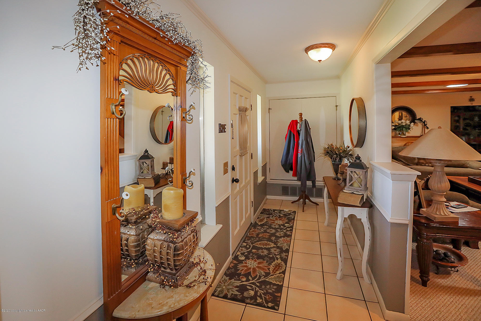 6012 Gainsborough Road Amarillo, TX 79106 - Photo 4 of 15 a view of walk in closet with clothes and shoes