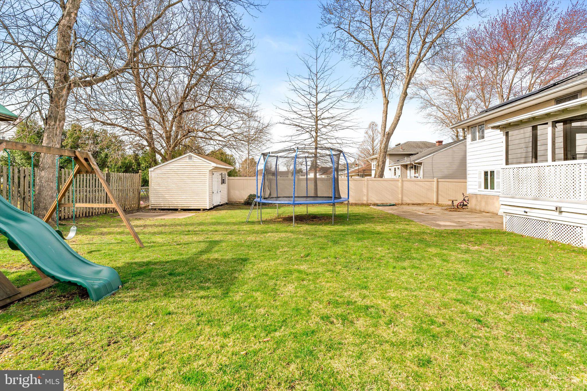 77 Gary Drive Hamilton, NJ 08690 - Photo 22 of 26 a view of a house with a big yard