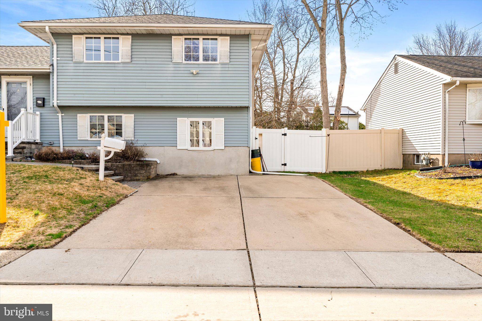 77 Gary Drive Hamilton, NJ 08690 - Photo 25 of 26 a view of a house with a patio