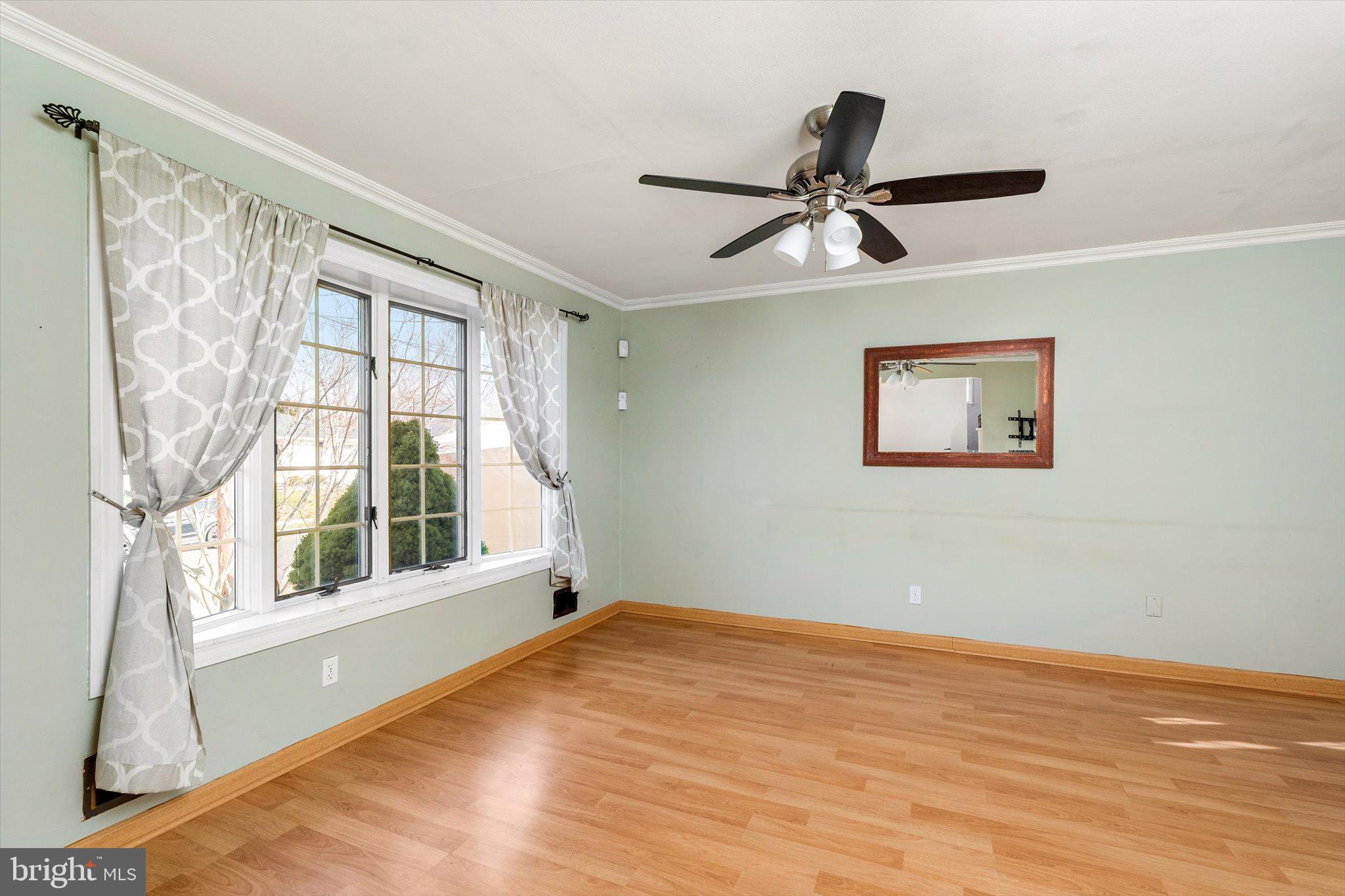 77 Gary Drive Hamilton, NJ 08690 - Photo 4 of 26 a view of empty room with windows