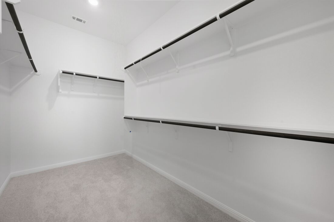220 Wingstem Way Georgetown, TX 78633 - Photo 11 of 35 a view of an empty walk in closet