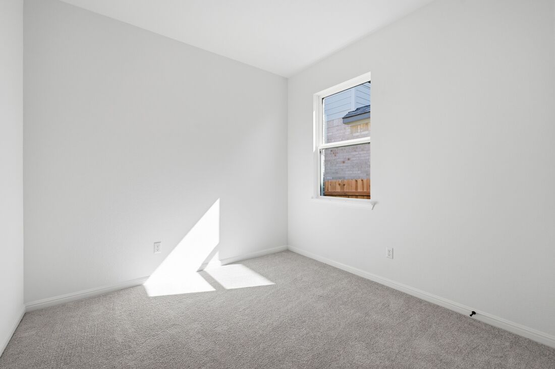 220 Wingstem Way Georgetown, TX 78633 - Photo 12 of 35 a view of an empty room with a window