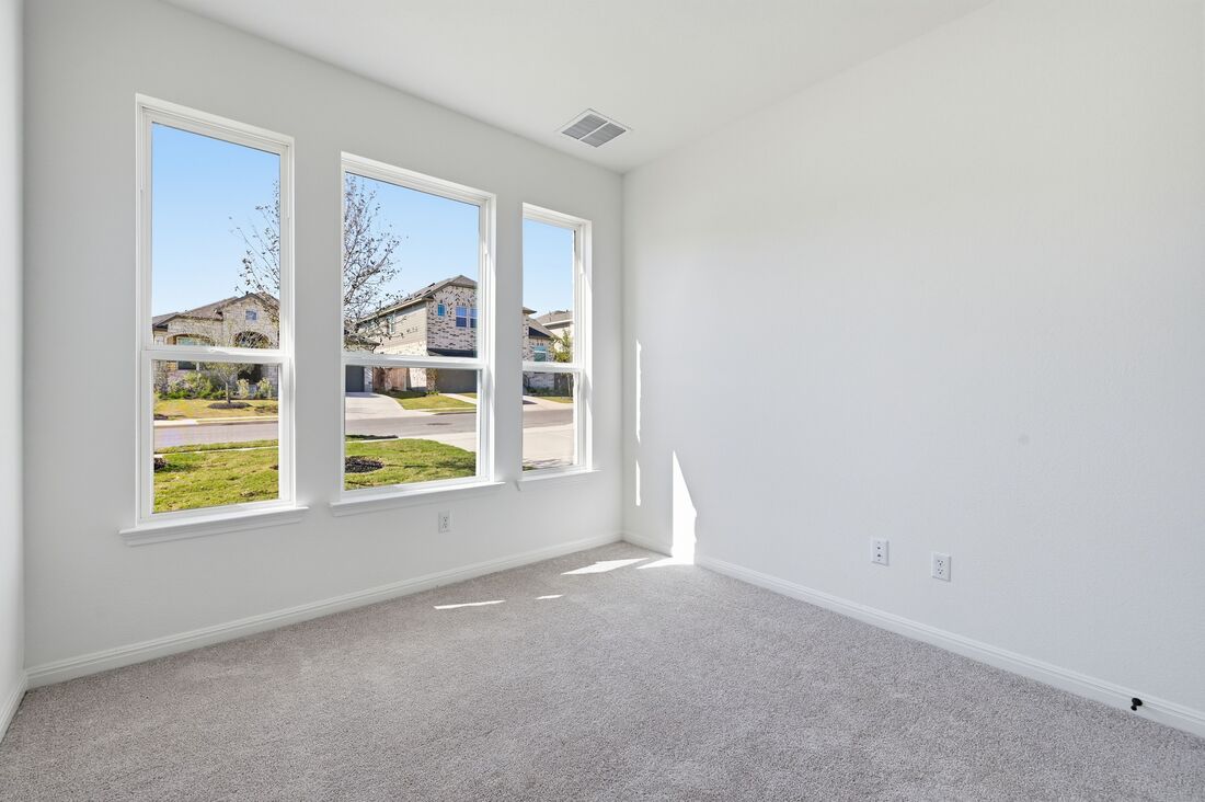 220 Wingstem Way Georgetown, TX 78633 - Photo 13 of 35 a view of an empty room with a window